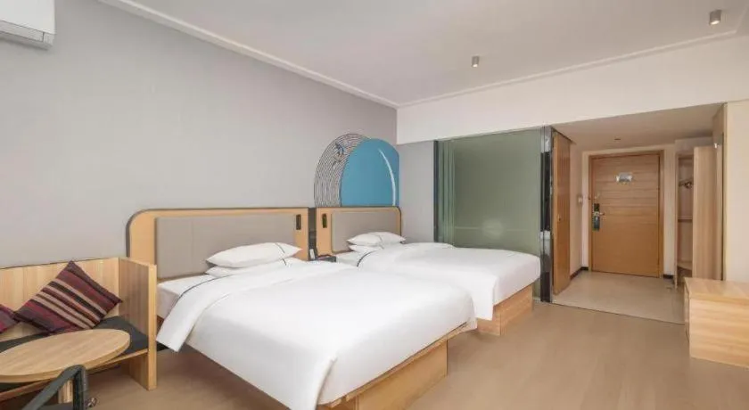 Bed in City Comfort Inn Yongzhou Jinshuiwan