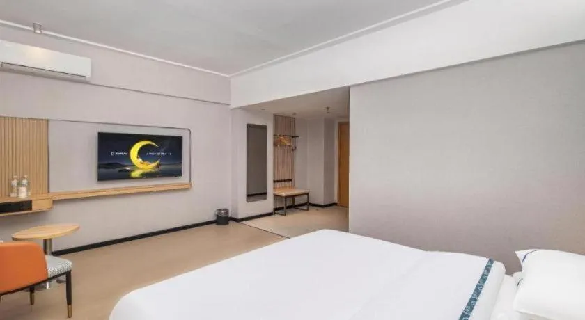Bed in City Comfort Inn Yongzhou Jinshuiwan