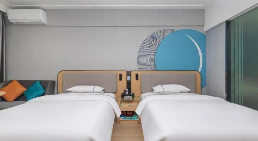 Bed in City Comfort Inn Yongzhou Jinshuiwan
