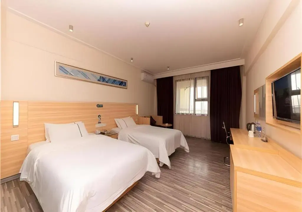 Bed in City Comfort Inn Yongzhou Jinshuiwan Bed in City Comfort Inn Yongzhou Jinshuiwan