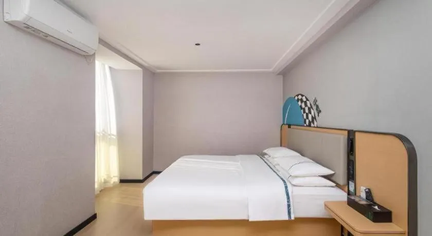 Bed in City Comfort Inn Yongzhou Jinshuiwan