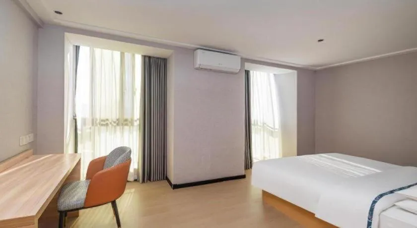 Bed in City Comfort Inn Yongzhou Jinshuiwan