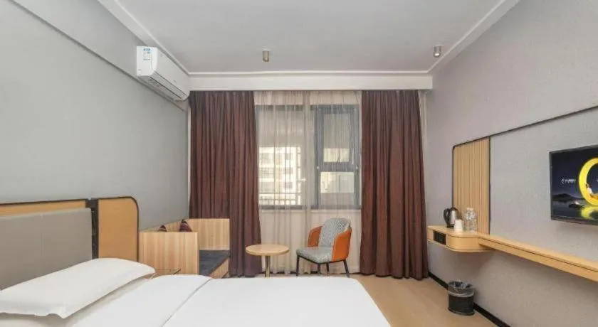 Bed in City Comfort Inn Yongzhou Jinshuiwan