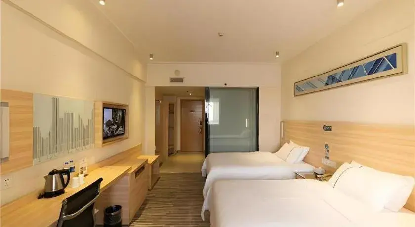 Bed in City Comfort Inn Yongzhou Jinshuiwan Bed in City Comfort Inn Yongzhou Jinshuiwan