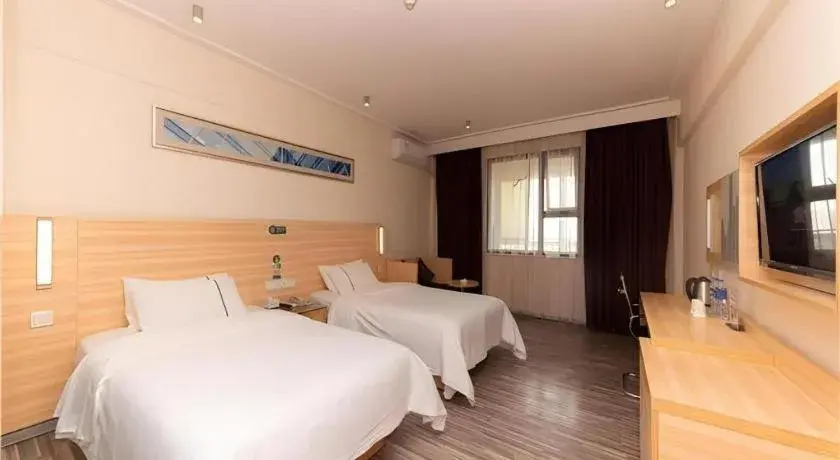 Bed in City Comfort Inn Yongzhou Jinshuiwan Bed in City Comfort Inn Yongzhou Jinshuiwan