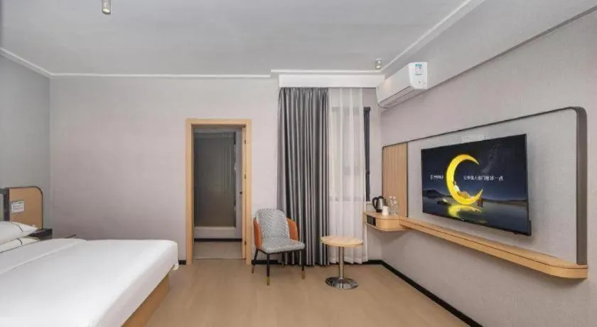 Bed in City Comfort Inn Yongzhou Jinshuiwan