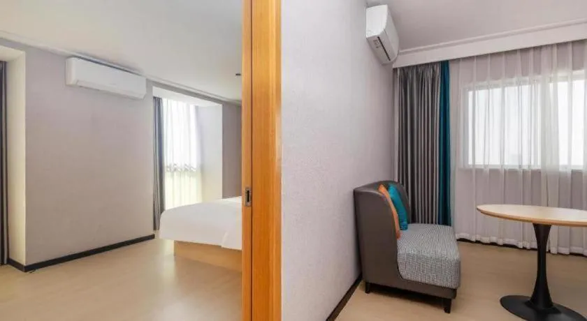 Bed in City Comfort Inn Yongzhou Jinshuiwan