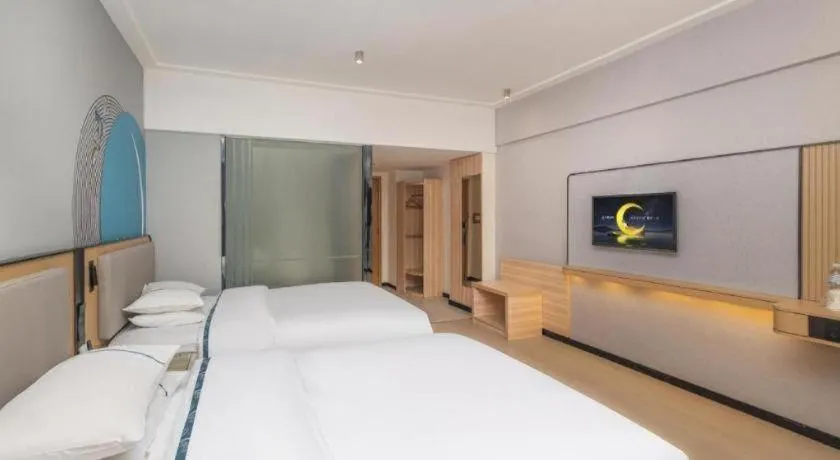 Bed in City Comfort Inn Yongzhou Jinshuiwan