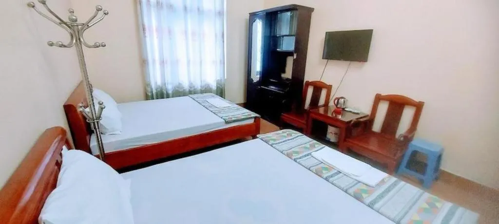Bed in Linh Dan Hotel