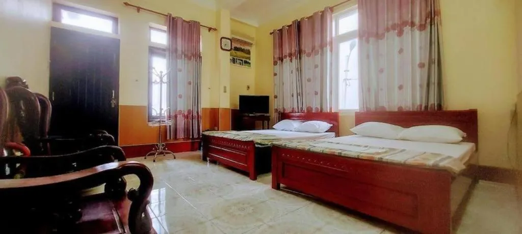 Bed in Linh Dan Hotel