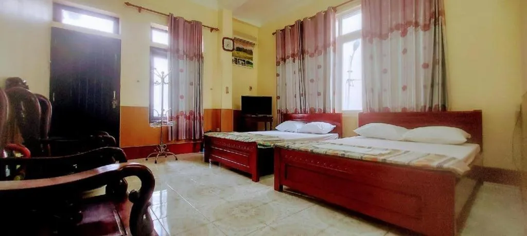 Bed in Linh Dan Hotel