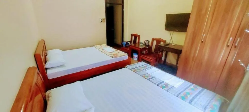 Bed in Linh Dan Hotel