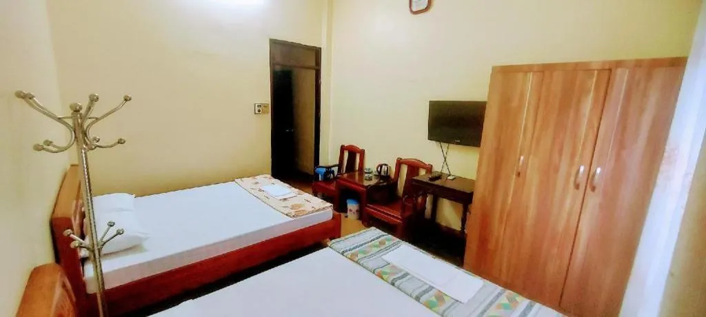 Bed in Linh Dan Hotel