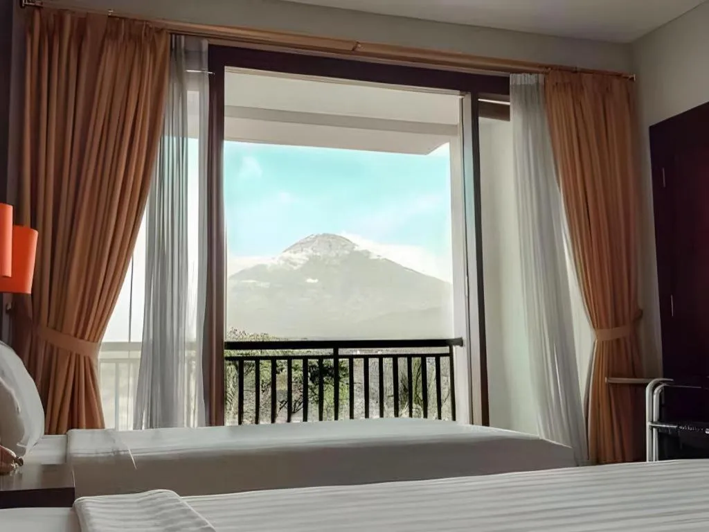 Bed in The Oxalis Regency Hotel