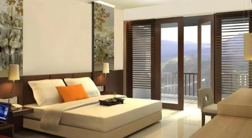 Bed in The Oxalis Regency Hotel