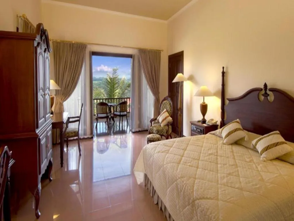 Bed in The Oxalis Regency Hotel