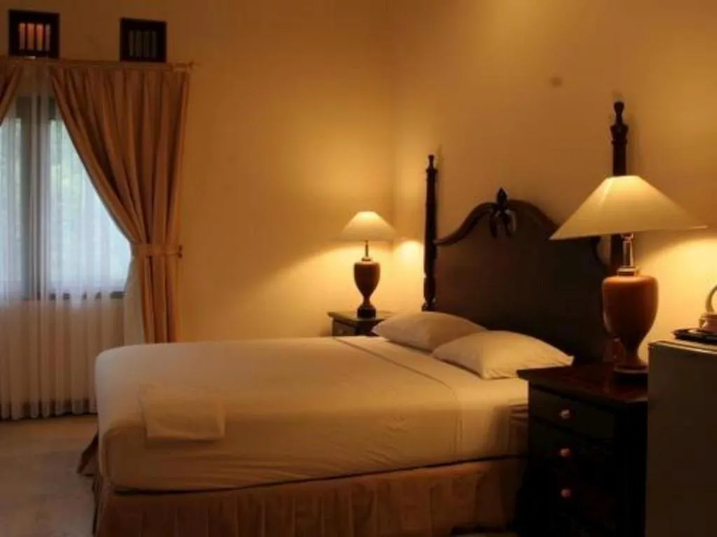 Bed in The Oxalis Regency Hotel