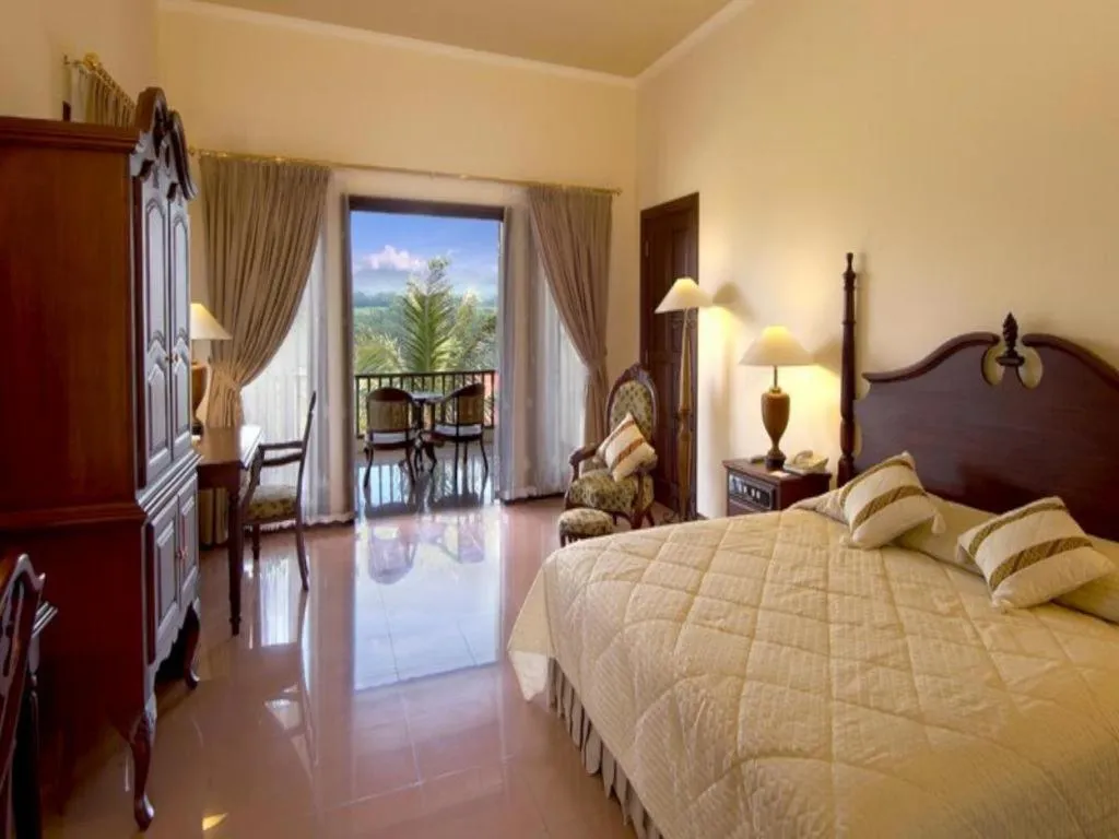 Bed in The Oxalis Regency Hotel