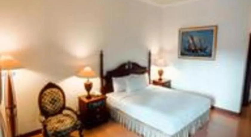 Bed in The Oxalis Regency Hotel