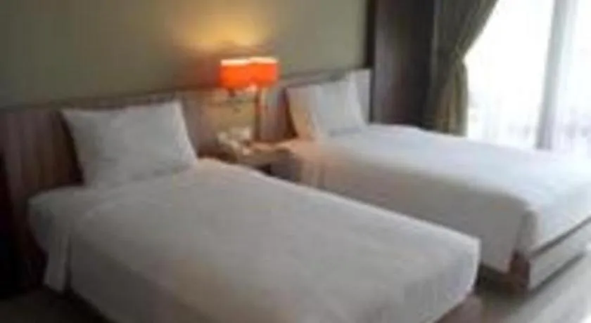 Bed in The Oxalis Regency Hotel