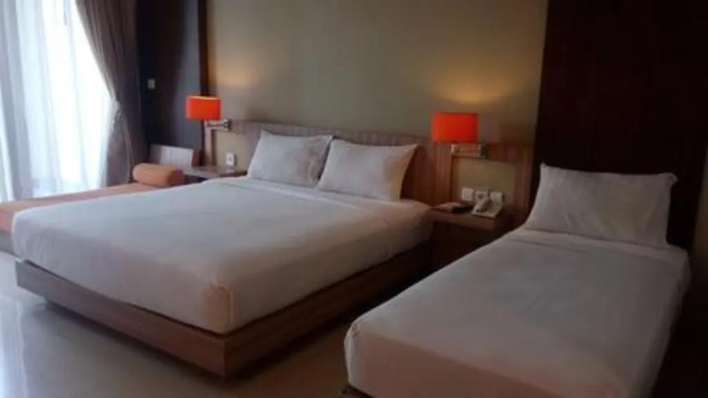 Bed in The Oxalis Regency Hotel