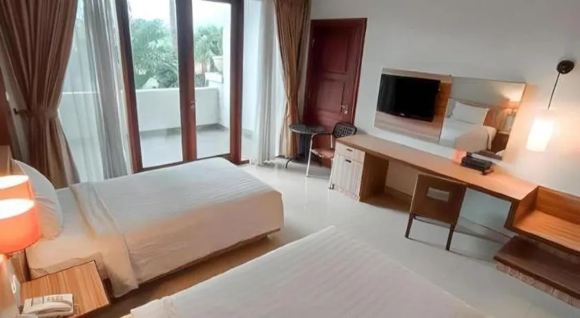 Bed in The Oxalis Regency Hotel