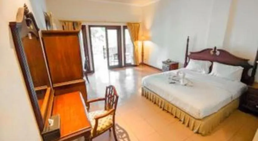 Bed in The Oxalis Regency Hotel