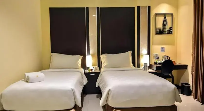 Bed in Sunbreeze Hotel Bed in Sunbreeze Hotel