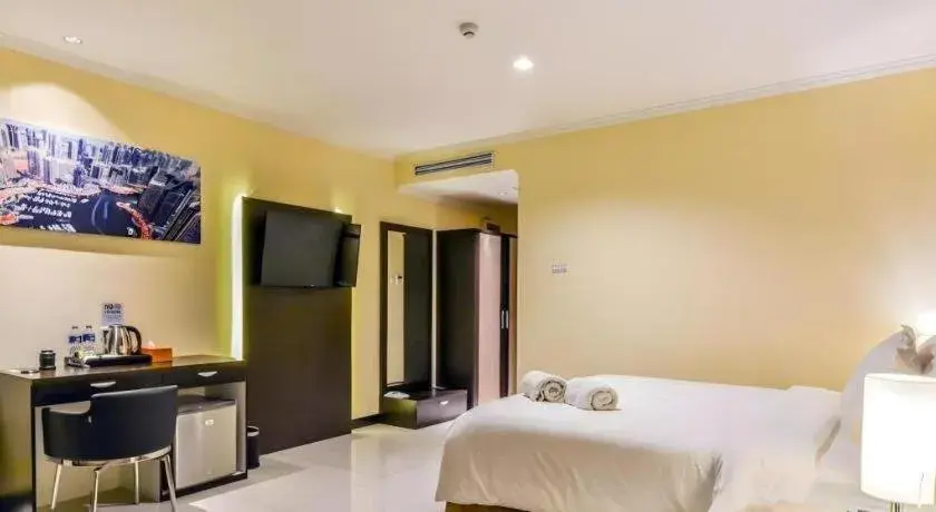 Bed in Sunbreeze Hotel Bed in Sunbreeze Hotel