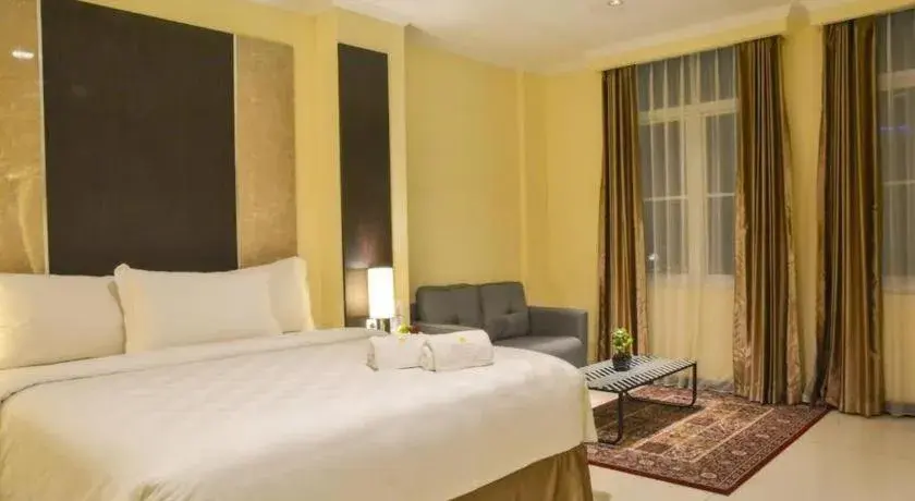 Bed in Sunbreeze Hotel Bed in Sunbreeze Hotel