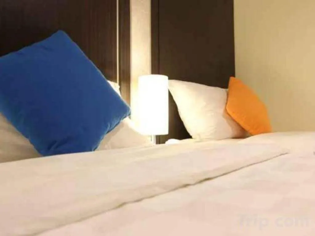 Bed in Sunbreeze Hotel