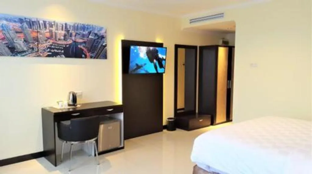 Bed in Sunbreeze Hotel