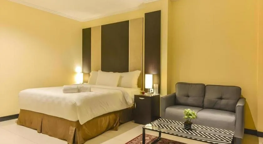 Bed in Sunbreeze Hotel