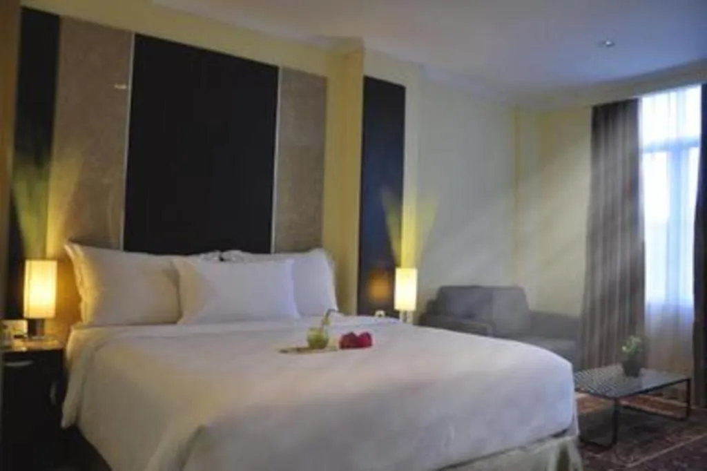 Bed in Sunbreeze Hotel