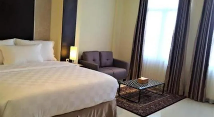 Bed in Sunbreeze Hotel