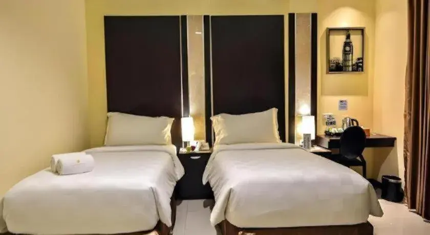 Bed in Sunbreeze Hotel Bed in Sunbreeze Hotel