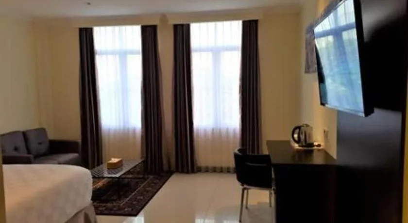 Bed in Sunbreeze Hotel