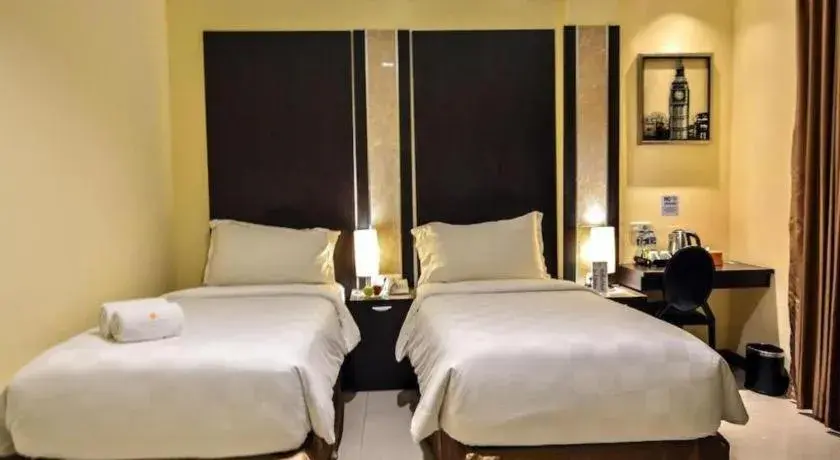 Bed in Sunbreeze Hotel Bed in Sunbreeze Hotel