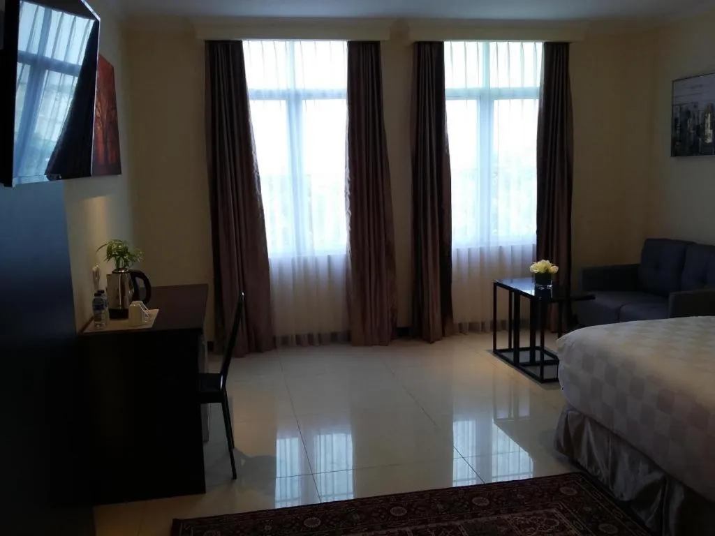 Bed in Sunbreeze Hotel