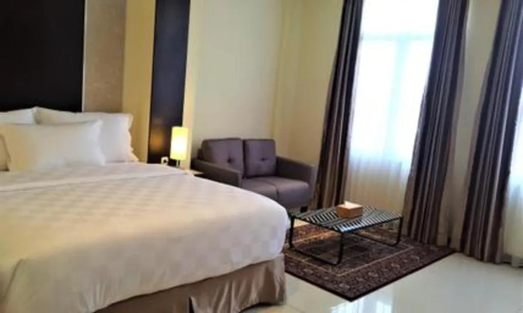 Bed in Sunbreeze Hotel