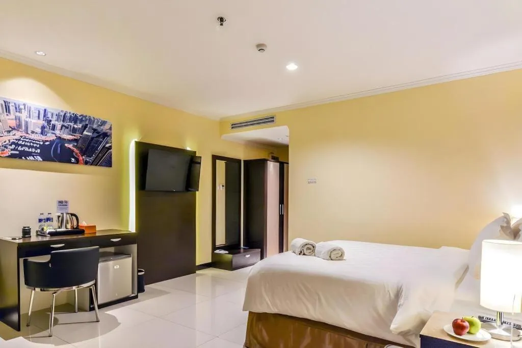 Bed in Sunbreeze Hotel