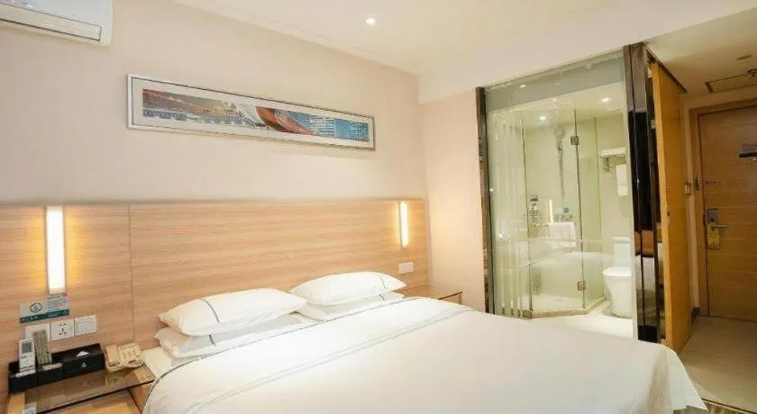 Bed in City Comfort Inn Yichang Gezhouba CBD Shopping Center