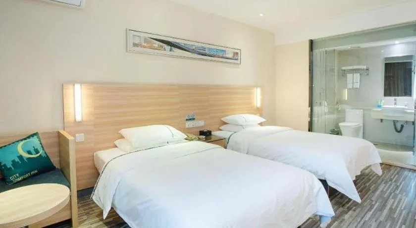 Bed in City Comfort Inn Yichang Gezhouba CBD Shopping Center