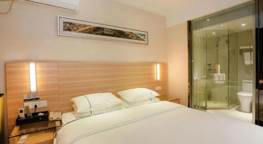 Bed in City Comfort Inn Yichang Gezhouba CBD Shopping Center