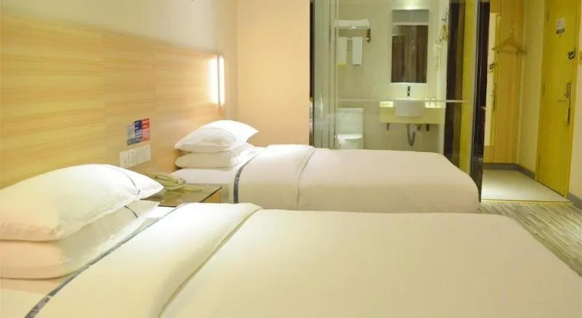Bed in City Comfort Inn Yichang Gezhouba CBD Shopping Center