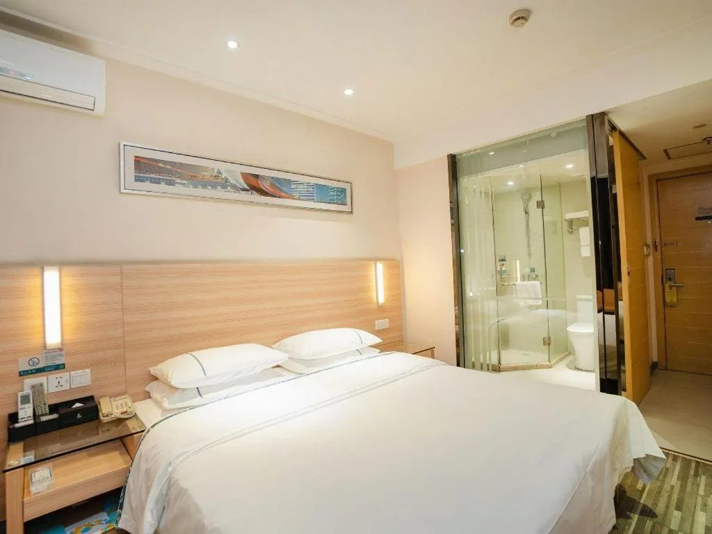 Bed in City Comfort Inn Yichang Gezhouba CBD Shopping Center