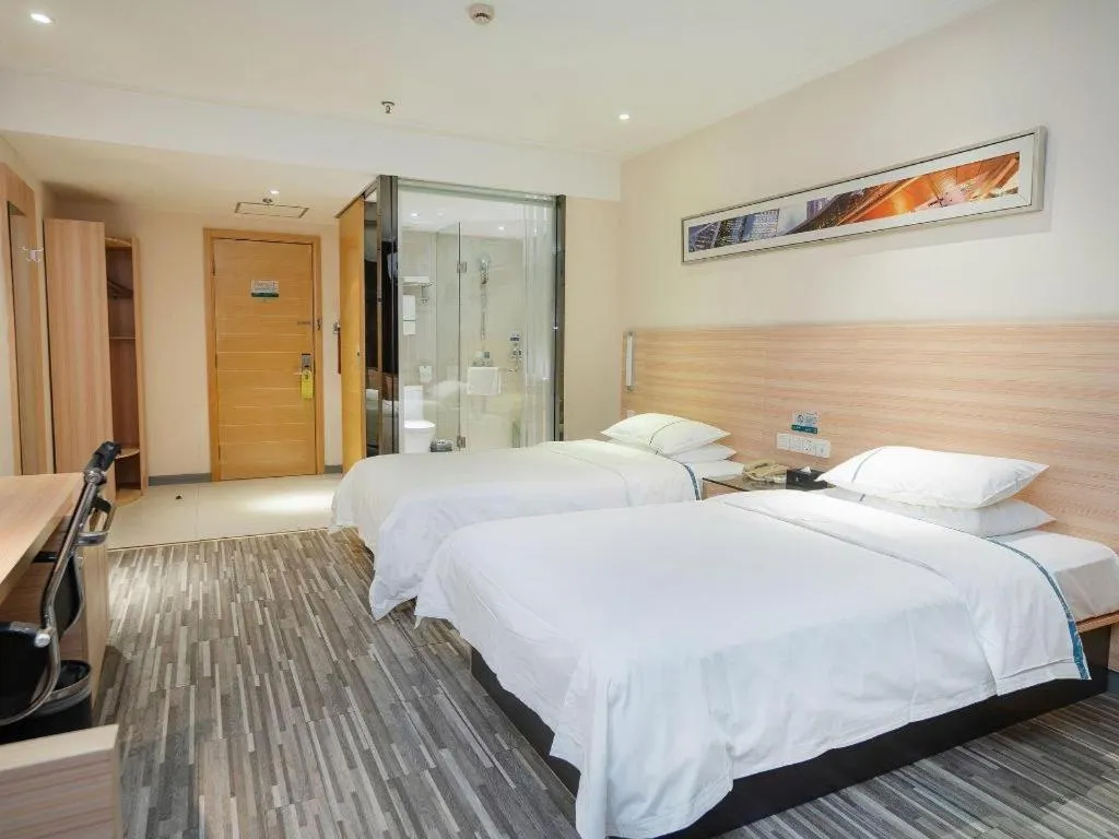 Bed in City Comfort Inn Yichang Gezhouba CBD Shopping Center