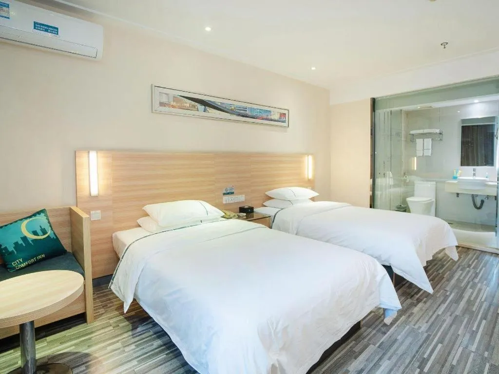 Bed in City Comfort Inn Yichang Gezhouba CBD Shopping Center