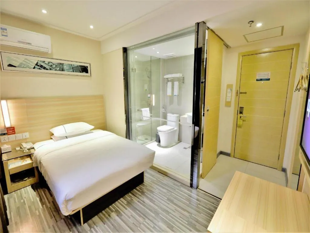 Bed in City Comfort Inn Yichang Gezhouba CBD Shopping Center