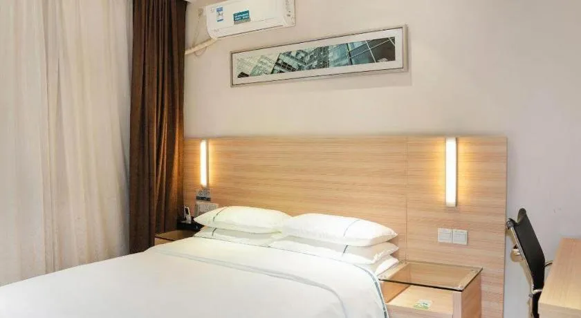 Bed in City Comfort Inn Yichang Gezhouba CBD Shopping Center